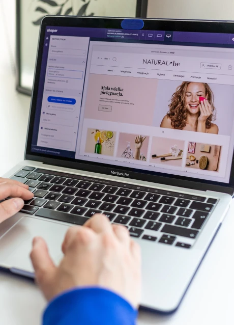 Business user managing an online store through a laptop