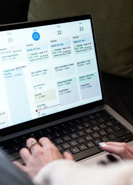 Manufacturing planning and scheduling data displayed on a laptop