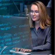 Developer working on software code at a computer